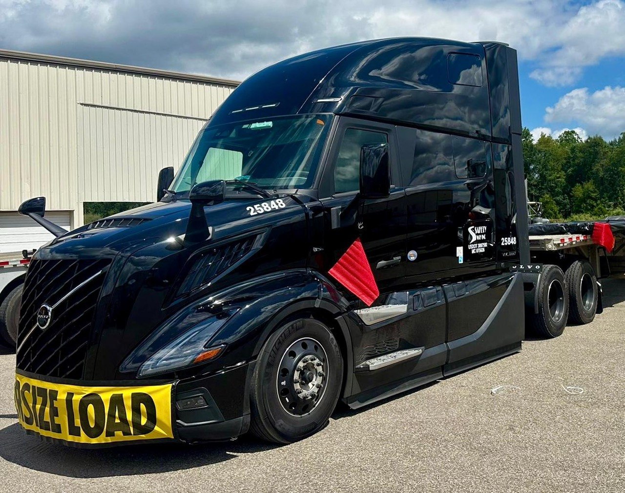 Volvo VNL carrying oversize load cargo